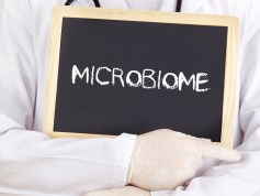 doctor holds microbiome sign doctor holds microbiome sign